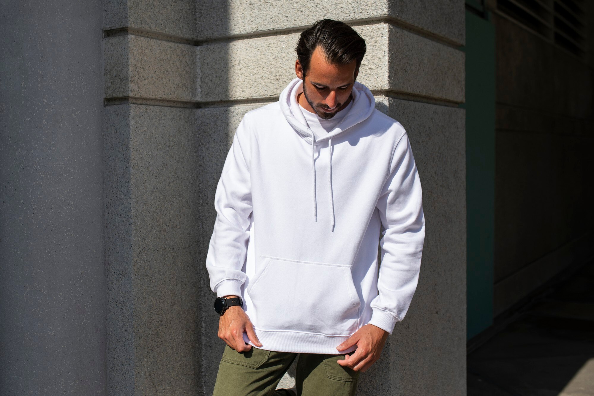 white-hoodie-man-with-green-pants-city_53876-105533